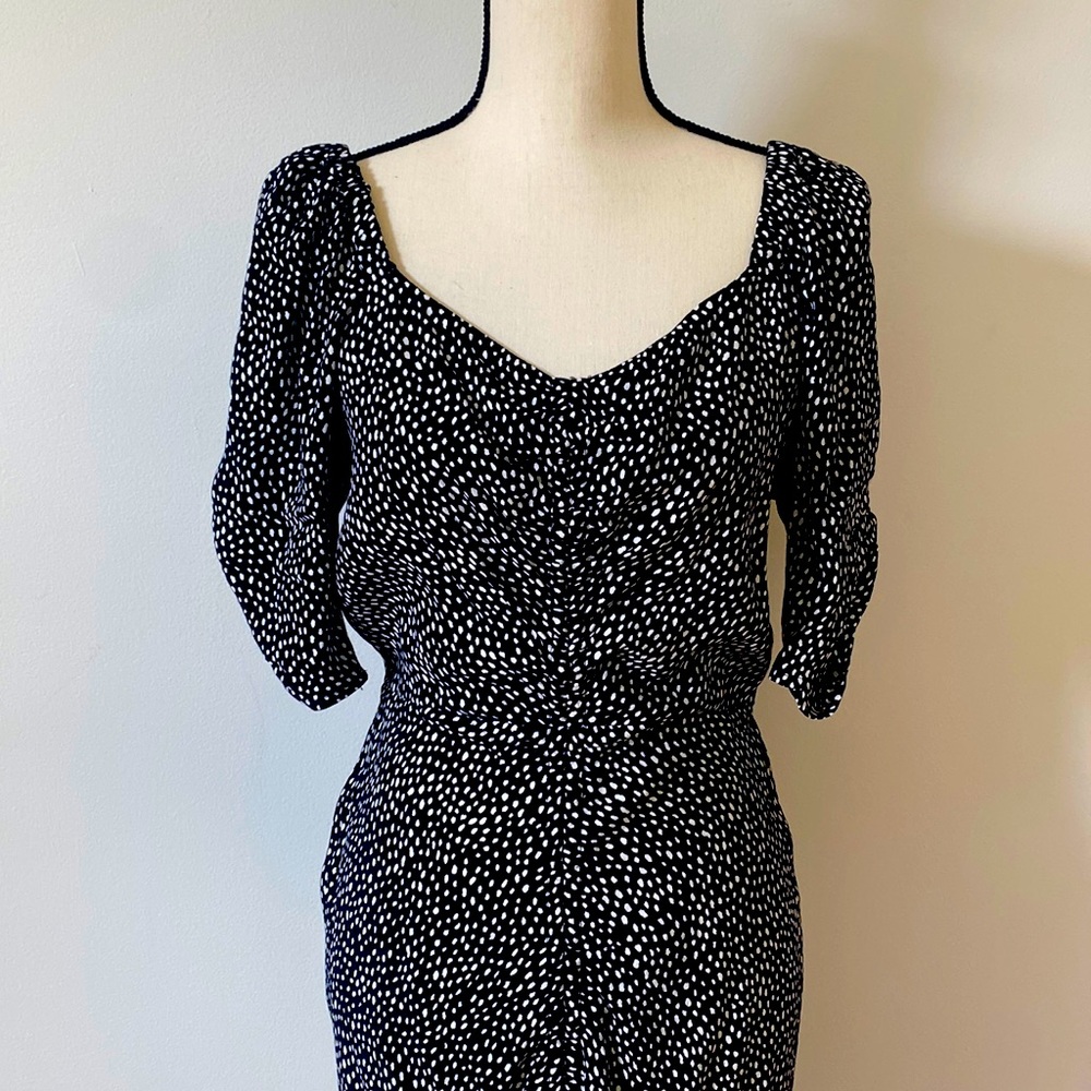 Black with white dress, with front slit.